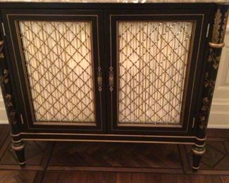 Pair of beautiful beveled  marble tops, with ebony black  and gold trimmed 2 door cabinets $3000 each