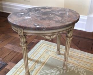 Antique marble oval end table measuring 20”x16” & 18”tall $275