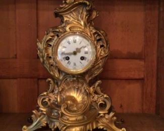 Exquisite gold mantle clock, key turn $4100
