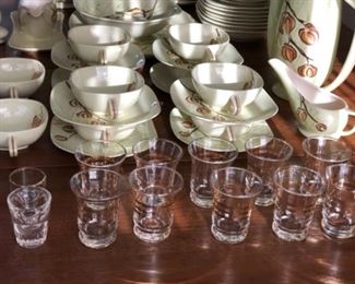 2 shot glasses, 10 vintage juice glasses with gold bands.