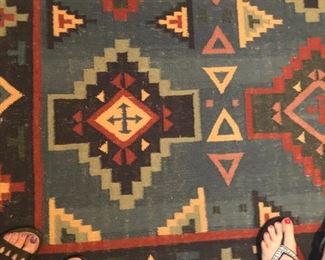 We have rugs! And also admirable pedicures.