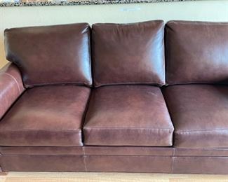 Make yourself comfy in your leather sofa bed with inflatable mattress!