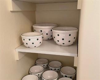 Polka dot dishware are among the featured items.