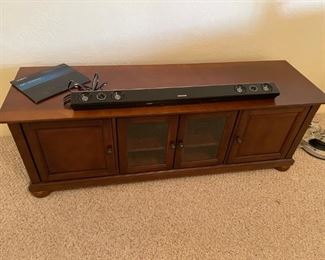 Got TV? We have a console unit for you, plus a speaker bar to make things sound oh so clearly.