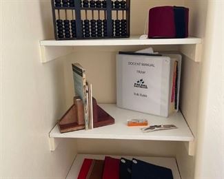 Abacus, fez, and early flying manuals. Good stuff.