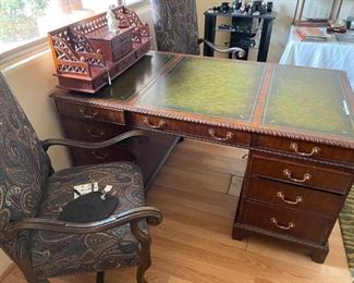 Pristine mahogany partner's desk with leather top. It is the perfect solution for working at home during the pandemic.