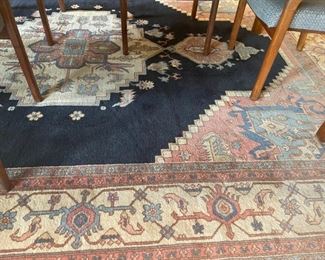10 x 12 wool on cotton Persian carpet with an octagonal blue center.
