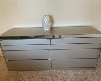 The photo does not do it justice. The mirror and chrome bedroom set is it!!