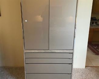 Add a TV console armoire with drawers and the look is complete.