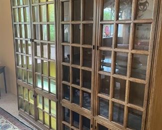 Two exceptional mid-century modern walnut bookcases or china cabinets with lighting are looking for a new home.