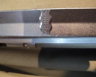 Three sections and track of modern fold accordion doors, aluminum and green vinyl