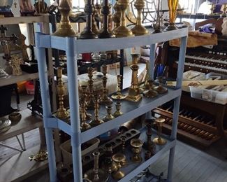 More brass candlesticks, candle accessories