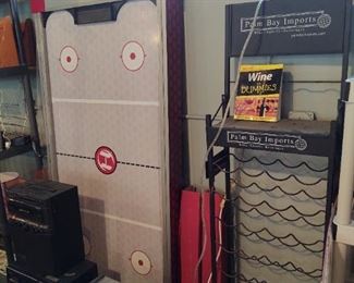 Foosball table, wine rack, karaoke machines