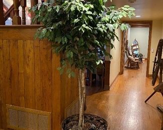Faux ficus tree in decorative basket