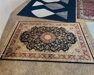 Large selection of rugs