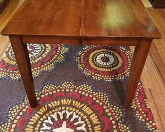 Wood table and area wool rug for sale