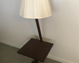 Handcrafted table lamp with shade.