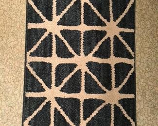 Rug - Teal with white bamboo design.