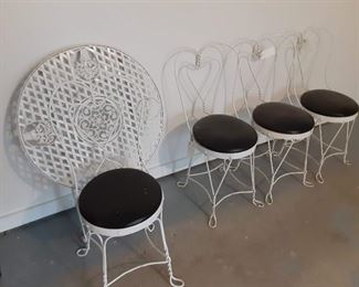 Folding iron ice cream table and 4 chairs $70