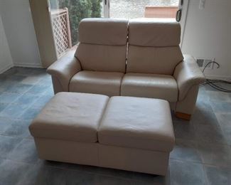 Leather loveseat and leather ottoman cream color $150
