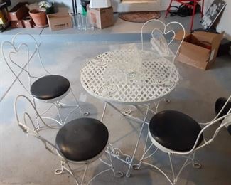 Cast iron ice cream table and 4 chairs heart-shaped