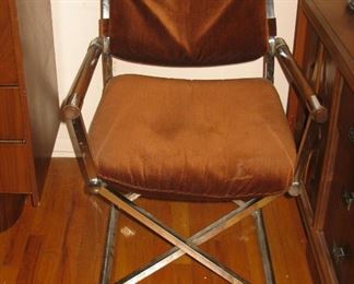 chrome and wood frame chairs, there are 2