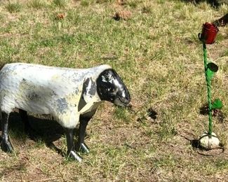 Metal garden sheep and flower