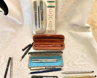Assortment of nice pens, Waterman Fountain Pen, Schaefer Pen Set, 2 Cross pens, airline pens, wood case pen, new in box pen set, 2 misc. pens.