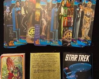 Star Wars bookmarks "1995", Jurassic Park cards, Star Trek labels in the box.