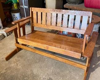 Child's wooden bench swing