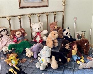 Stuffed Animals - Care Bear, Sesame Street, Panda, Monkey with banana, bears