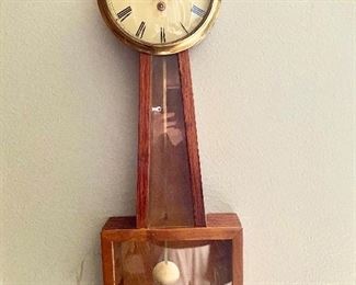 Vintage hand crafted clock with key
