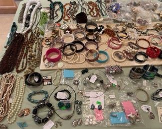 Table full of costume jewelry / sterling & custom