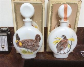 J.W. Dant Canadian whiskey decanters.  1969 bob white and prairie chicken by A. Singer