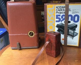 Kodak carousel slide projector model 5200 and Revere projector model 85 and camera model 55 with Bakelite case. 