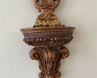 One of two wall sconces