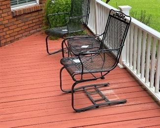Wrought iron spring chairs & small table