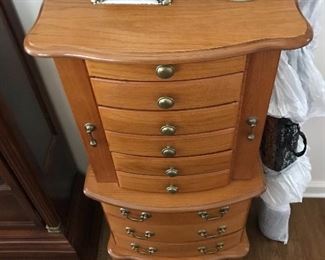 A great jewelry armoire lid lifts for ring storage, sides open for necklace hangings, plus seven drawers to organize your jewelry