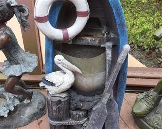 Nautical themed resin garden statue