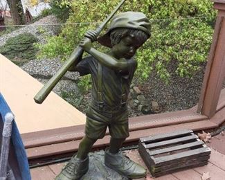 Child golf bronze statue by Jim Davidson