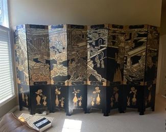 ITEM 8: Monumental eight-panel black and gold folding screen; each panel separates from the others to be moved easily. each panel is 18” x 84” for a total of 126” wide when fully extended. $975