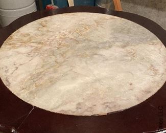 ITEM 10: Carved wood marble inset table with four matching marble inset stools. This piece has some condition issues, and needs some clamps and glue to return it to full beauty. $495