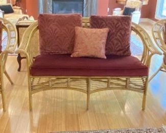 ITEM 12: Rattan three piece seating set. Loveseat and two arm chairs. 55” wide, 33” deep, 33” tall chair is 32” wide. $575
