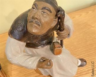 ITEM 17: Two ceramic Chinese figures. Female has damage to hands as shown. $75