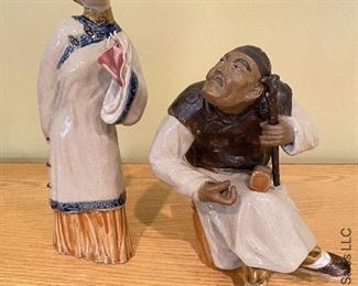 ITEM 17: Two ceramic Chinese figures. Female has damage to hands as shown. $75
