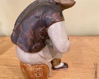 ITEM 17: Two ceramic Chinese figures. Female has damage to hands as shown. $75