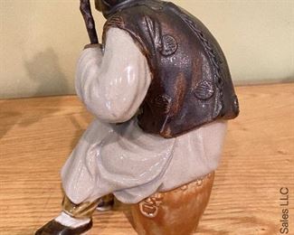 ITEM 17: Two ceramic Chinese figures. Female has damage to hands as shown. $75