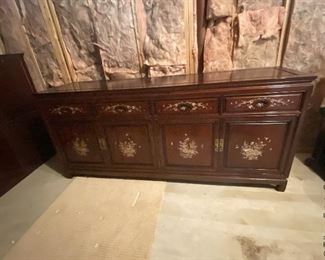 ITEM 7A: Mother of pearl inlay two-piece display cabinet. Can be used together as a china cabinet, or with the base only as a sideboard. Matches table and chairs (item 7). 6'1" (L) X 14" (W) 6'10" (H) $950
