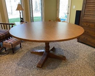 ITEM 19: Round oak pedestal table. 5' Round. 5'X 29 1/2" (H) $225