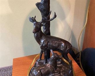 ITEM 25: Set of 3 metal lamps with deer, some damage as shown $95